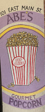 Load image into Gallery viewer, Abe's Gourmet sign at the entrance to the store