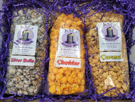 Box of Silver Bells, Caramel, Cheddar popcorn bags