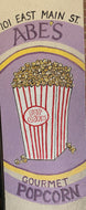 Abe's Gourmet sign at the entrance to the store