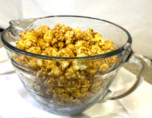 Load image into Gallery viewer, Abe&#39;s Caramel popcorn in a glass bowl. 
